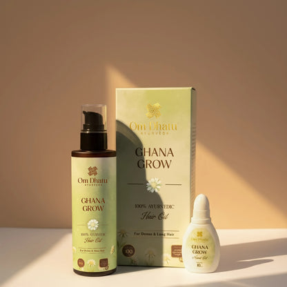 Omdhatu Ayurvedic hair oil bottle with herbal ingredients, designed for hair growth and scalp nourishment.