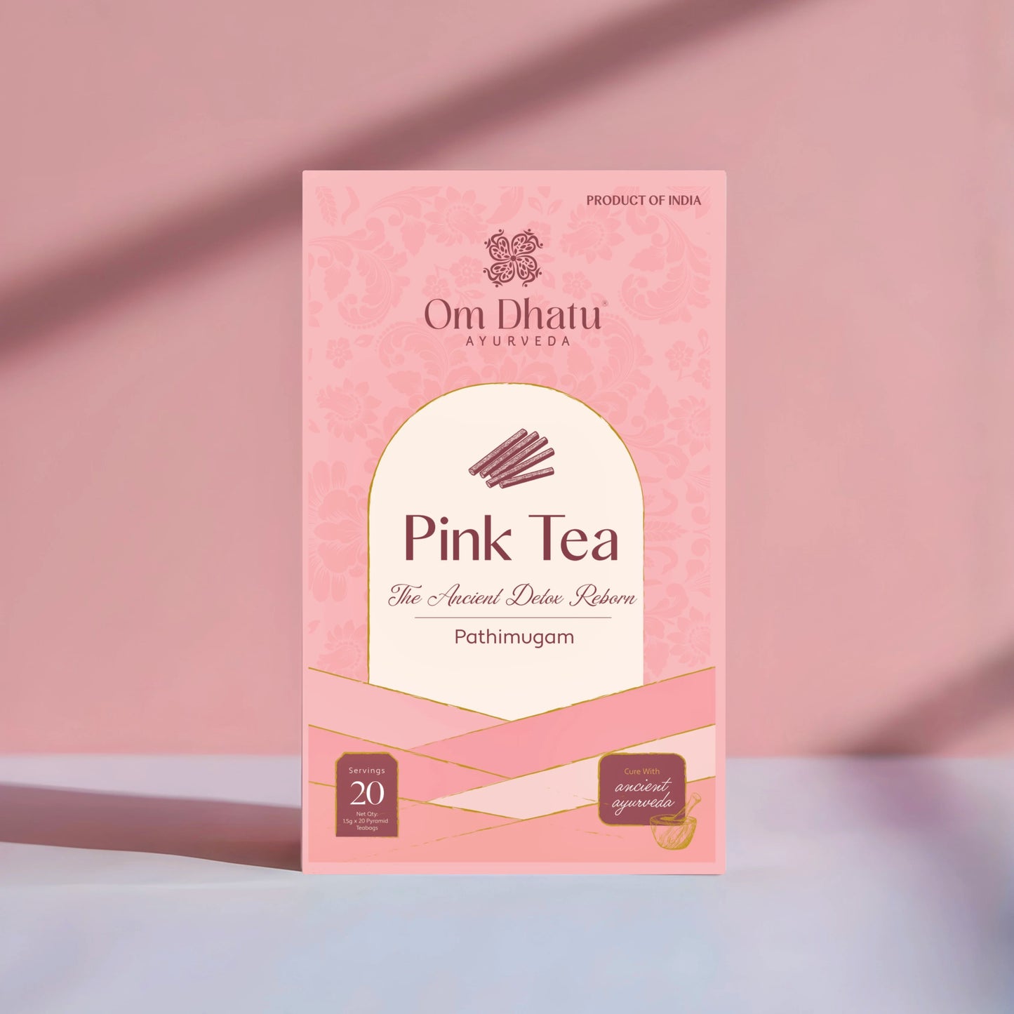 Close-up of dried Pathimugam (Patrang) heartwood chips used in the Omdhatu Pink Tea blend.