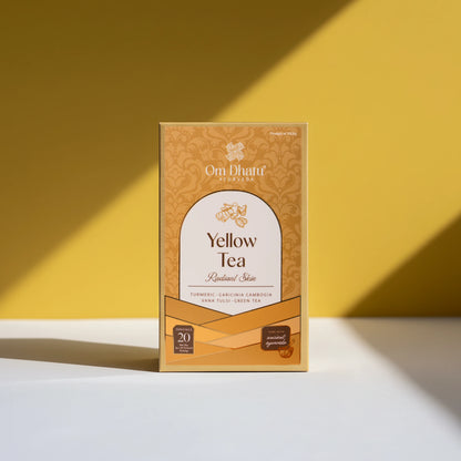 Box of Omdhatu Ayurvedic Yellow Tea bags, featuring bright, sun-kissed botanicals for energy and radiance